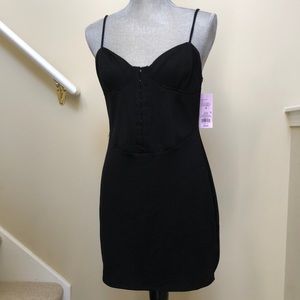 New women’s black dress.  Size M.  Eyelets going down front middle.